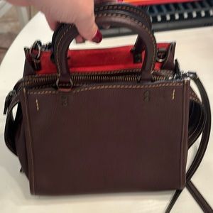 Dark burgundy leather Rogue Coach bag